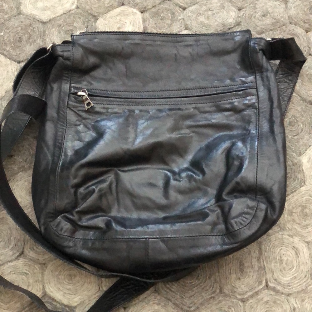Rugby by North America now m0851black leather crossbody bag.